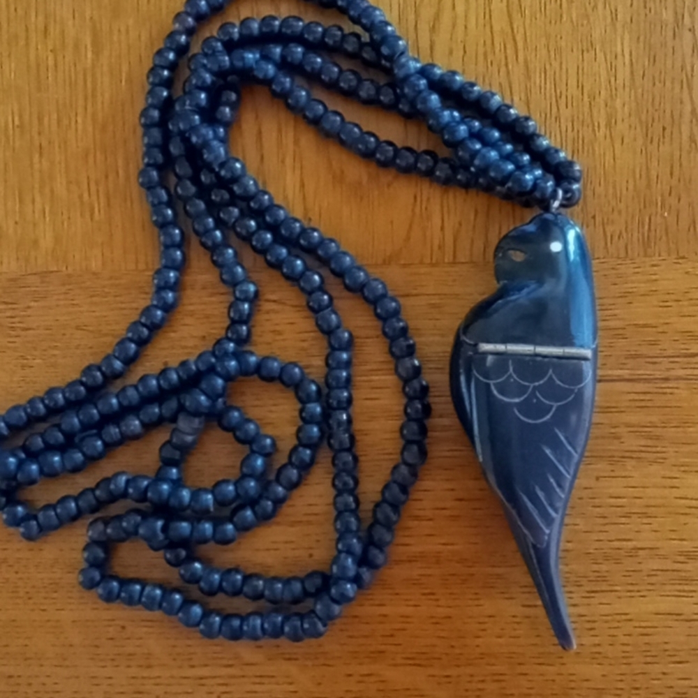 Carved Parrot Necklace with Hinged Compartment - Picture 1 of 9